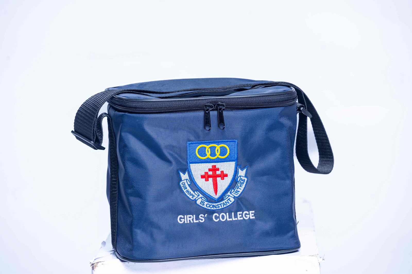 Navy Girls’ College food bag with embroidered crest and shoulder strap